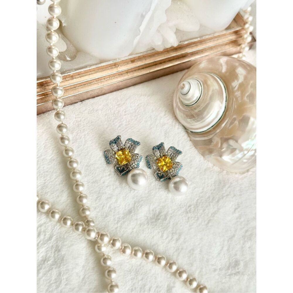 Canary Princess cut cubic zirconia flower with faux pearl dangle and light blue